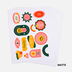 Sheet of colorful stickers with various designs on a white background